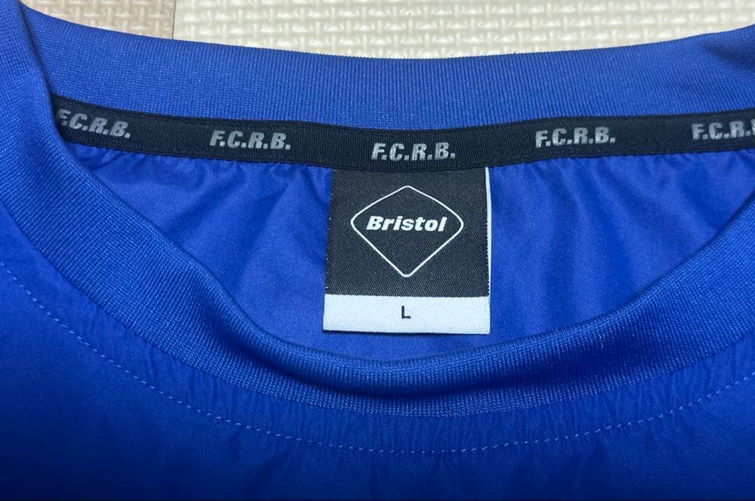 【未使用級】F.C.R.B. ブリストル ブルー ピステ L 背面ロゴ 極美品