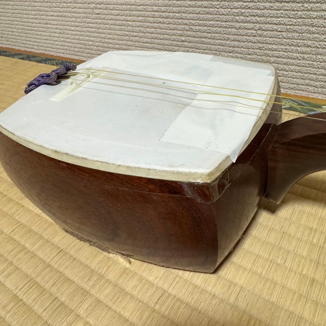三味線　紫壇　中棹　丸打ち胴　破れ有り　本体ケース　2点セット